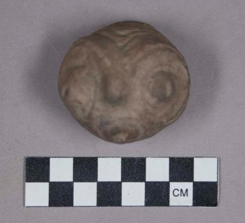 Earthenware anthropomorphic effigy sherd with modeled and incised features