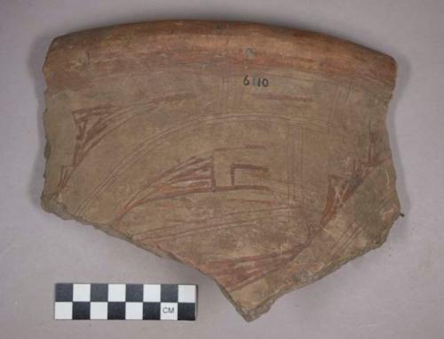 Earthenware rim and body sherd with incised designs