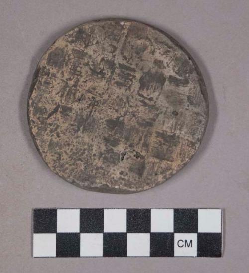 Earthenware disk