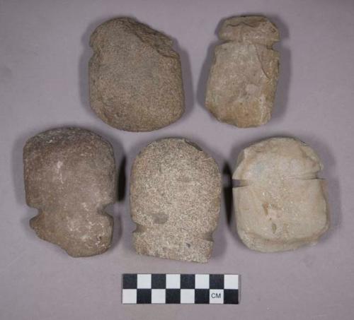 Ground stone axes, notched