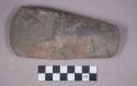 Ground stone celt blade