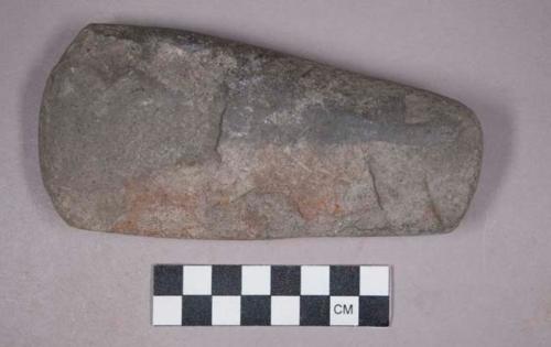 Ground stone celt blade