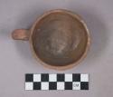 Earthenware cup with handle