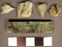 Fragment of engraved jadeite tablet, unfinished reconstruction (TP/68)