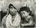 Wife of the medicine man and grandchild