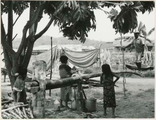 Preparations for the chicha fiesta, sugar cane press