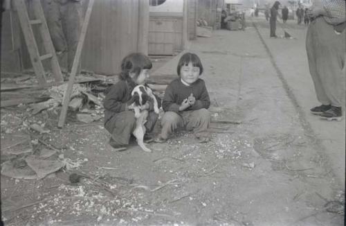 Two children with dog