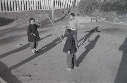 Children jumping rope