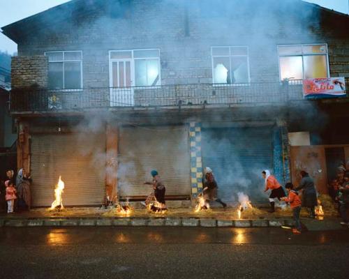 "People jump over seven fires on the night of Chaharshanbe Suri. This "festival of fire" takes place on the last Wednesday before Nowruz. Ramsar, Iran, 2015"