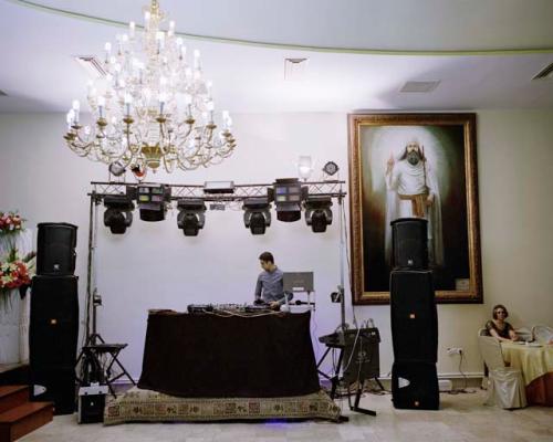 "The DJ at a Zoroastrian wedding held at the Tehran Fire Temple. Tehran, Iran, 2015"