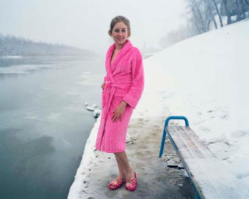 "A young woman poses before entering the icy water. Astrakhan, Russia, 2012"