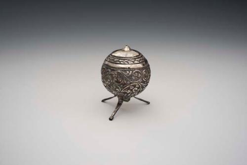 Repousse silver pepper shaker