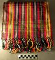 Scarf - warp striped in dark blue, red, green, yellow & white; the weft is red a