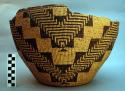 Large basket with brown triangular designs