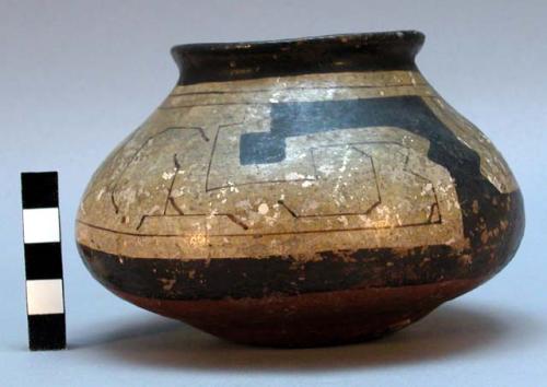 Jar, polychrome geometric design, sherd missing, cracked