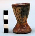 Small pottery cup with base