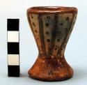 Small pottery cup with base