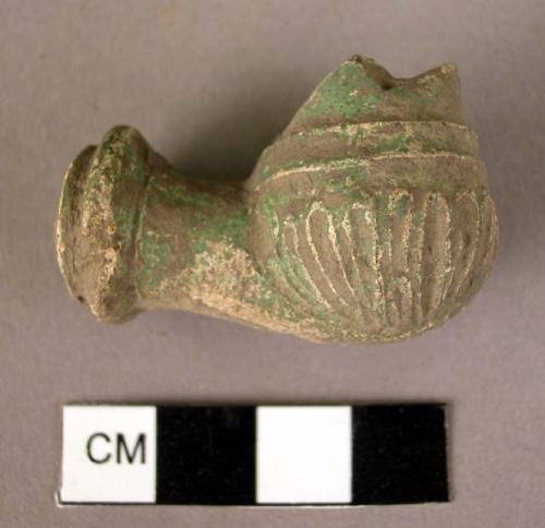 Broken bowl of clay pipe, incised design