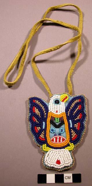 Beaded medallion. Felt backing. Multicolor beads.