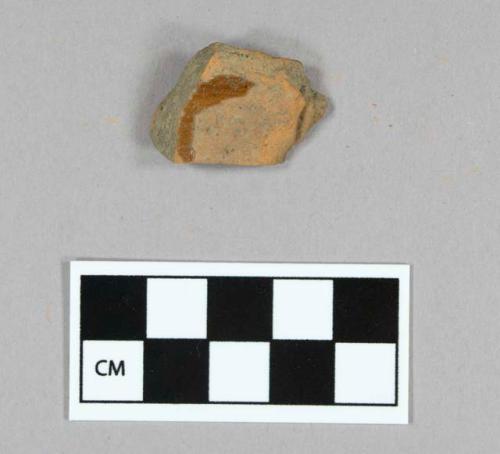 Ceramic, earthenware, redware, brown lead glaze, body sherd