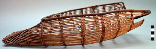 Small cradle of woven bamboo