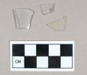 Glass, curved, clear, fragments