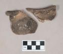 Ceramic, earthenware rim sherds, folded molded rim, cord-impressed body, shell-tempered; two sherds crossmend