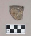 Ceramic, earthenware rim sherd, incised notched rim, undecorated, partially drilled hole, shell-tempered