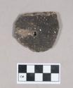 Ceramic, earthenware body sherd, cord-impressed, perforated, shell-tempered