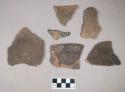 Ceramic, earthenware body and rim sherds, cord-impressed, shell-tempered; two sherds crossmend