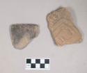 Ceramic, earthenware body sherd, cord-impressed and incised with possible Ramie design, shell-tempered; ceramic, earthenware rim sherd, notched rim, cord-impressed, shell-tempered