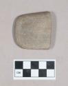 Ground stone, rectangular worked stone fragment, rounded edges