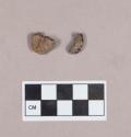 Ceramic, earthenware bead fragments, round; two fragments crossmend