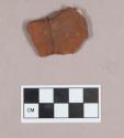 Red ochre pigment fragment