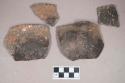 Ceramic, earthenware rim sherds, incised and molded rim, cord-impressed body, shell-tempered