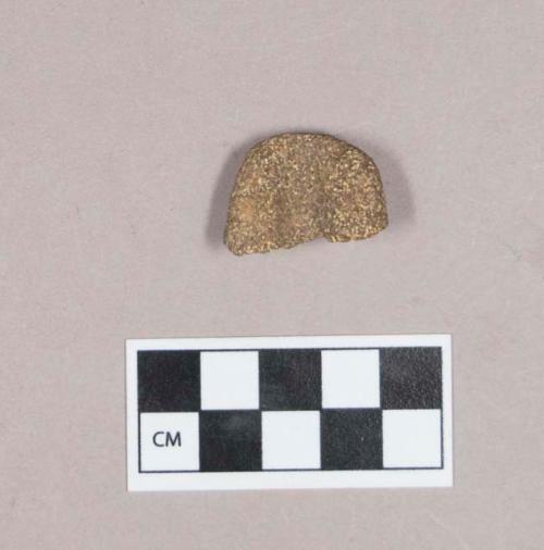 Ground stone, grooved stone fragment, likely abrading stone