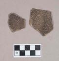 Ceramic, earthenware body sherds, cord-impressed, shell-tempered; two sherds crossmend