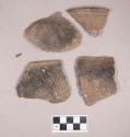 Ceramic, earthenware rim and body sherds, cord-impressed, shell-tempered; two rim sherds and one body sherd crossmend; one rim sherd and one body sherd crossmend