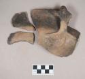 Ceramic, earthenware rim sherd, effigy handle, and two body sherds, cord impressed, shell temper; three sherds crossmend