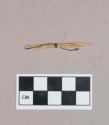 Worked bone fragments, flat, possible perforator; three fragments crossmend, tied together with string