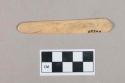 Worked animal bone object fragment, flat, one rounded end
