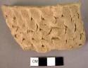 Rim potsherd-buff, corrugated ware