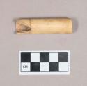 Worked animal bone tube, polished and incised