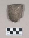 Ceramic, earthenware rim sherd, undecorated, shell-tempered; possible miniature vessel