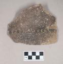 Ceramic, earthenware body sherd, cord-impressed and punctate, with possible handle attachment, shell-tempered