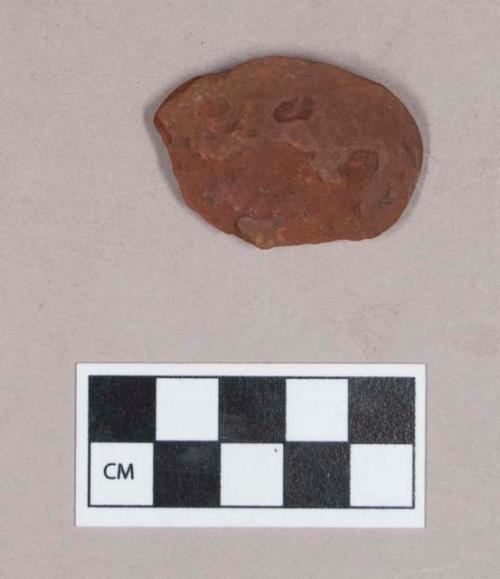 Red ochre pigment fragment