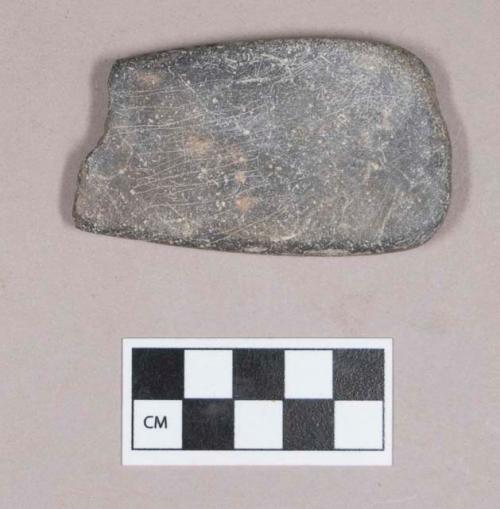 Ground stone, pecked and ground stone fragment, flat, rectangular fragment, polished and incised