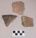 Ceramic, earthenware rim and body sherds, one cord-impressed, one incised with possible Ramie design, one with incised rim and cord-impressed and incised body, shell-tempered