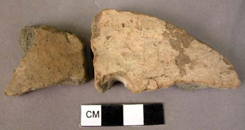 2 potsherds with white slip (Wace & Thompson, 1912, Type A)