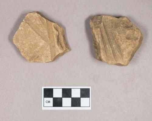 Ground stone, grooved stone fragments, possible abrading stones